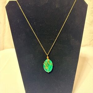 Handcrafted green howlite heart necklace with copper wire wrapping